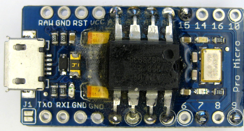 arduino with eeprom soldered and filled up with
        glue